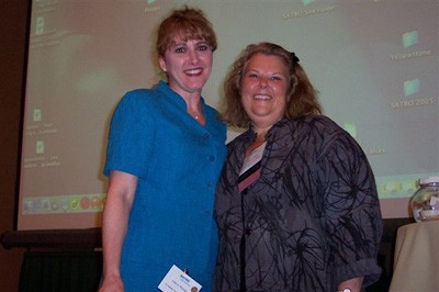 Cathy Wiesinger receives 5 year award from Marcia Phillips